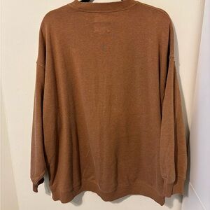 Worn in sweatshirt
